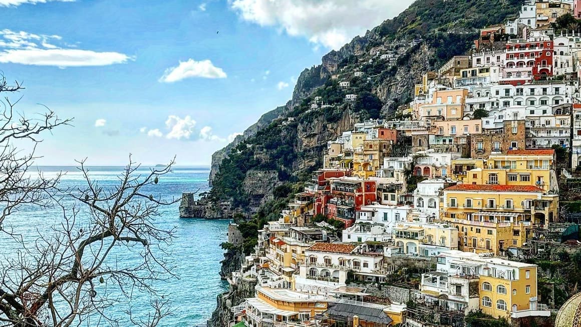 The colorful town of Riomaggiore, Italy. Riomaggiore is one of the five villages that make up the Cinque Terre, a picturesque stretch of coastline along the Italian Riviera. The town is known for its colorful houses that are built into the cliffs overlooking the Mediterranean Sea.